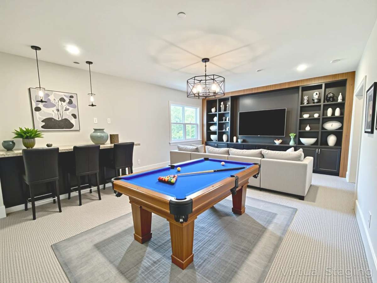 The bonus room is the perfect gathering spot for family and friends, or a private escape to unwind at the end of the day. Virtually staged photo for inspiration only & to showcase how space can be used & furnished.