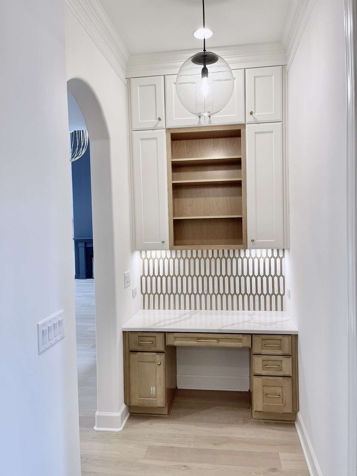 The built-in workstation is a smart and stylish feature designed to blend seamlessly into the home while providing a dedicated space for productivity.
