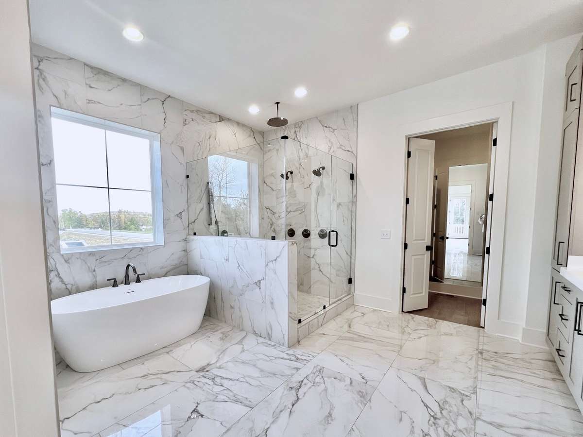 More than just a place to bathe and groom, the luxury primary bathroom is a private haven where you can escape the cares of the world.