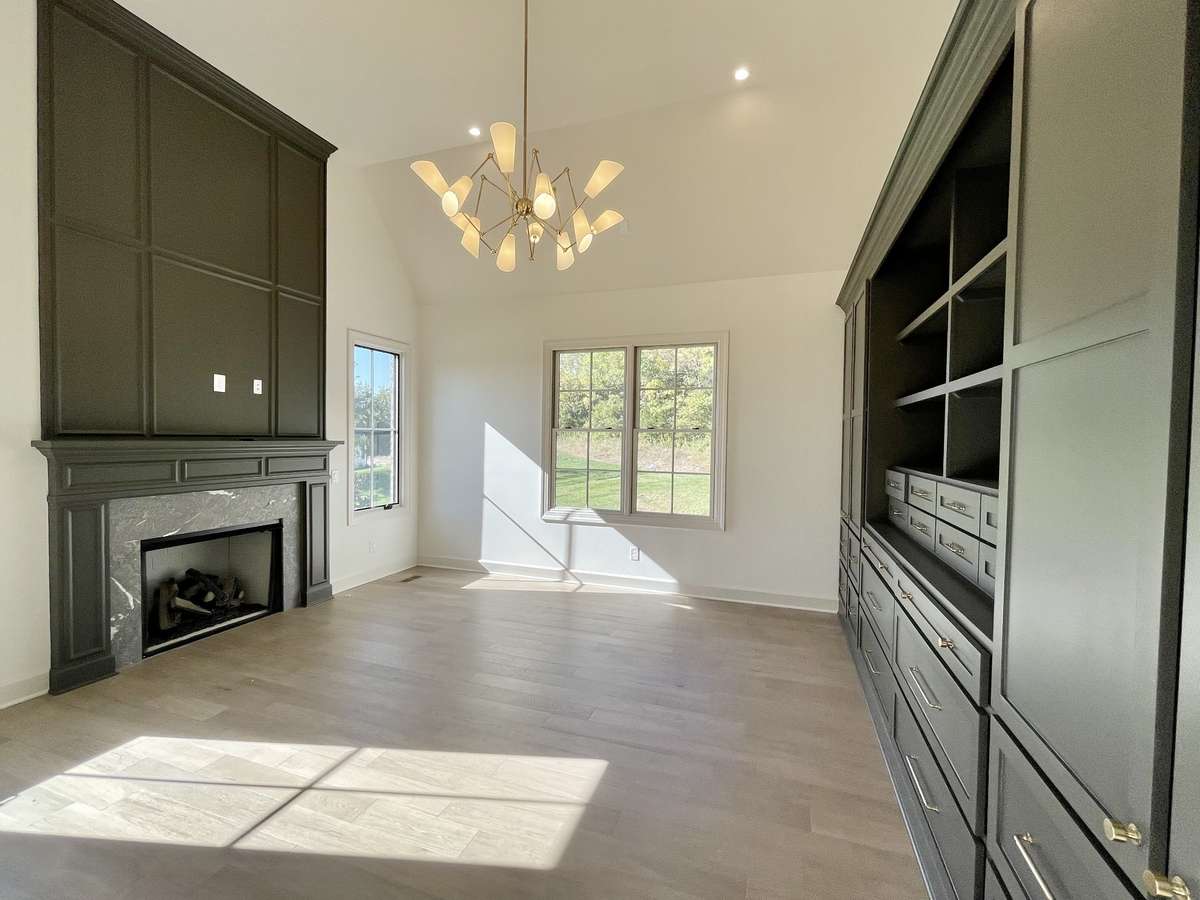 Whether used as a private office, library, or piano/music room, this space is designed for comfort, productivity, and timeless elegance. Home is at Drywall Stage—All photos of similar homes and for inspiration only.