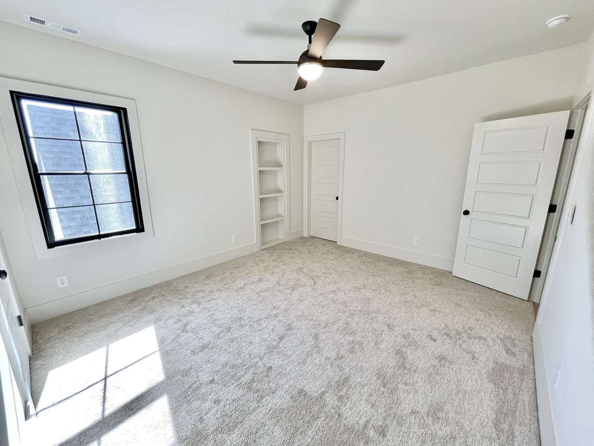 Upstairs features 3 spacious bedrooms with full en-suite bathrooms, 10' ceilings and 8' tall solid core doors.