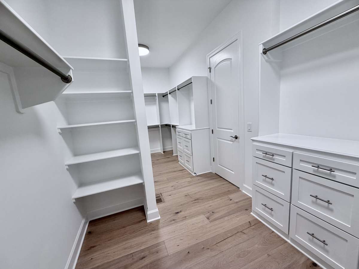 Prepare to be amazed as you step into the epitome of luxury—the huge primary walk-in closet. ALL Photos are of Similar Homes and NOT EXACT HOME.