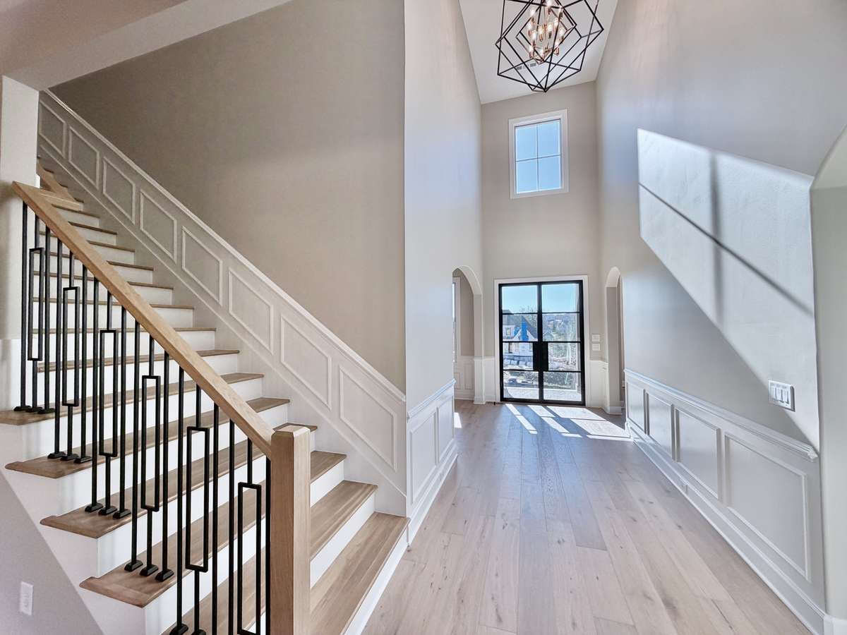 The moment you step inside, you're greeted by a grand foyer that sets the stage for the elegance that pervades every inch of this home. All Photos of Similar Homes — Actual Home is at Drywall Stage.