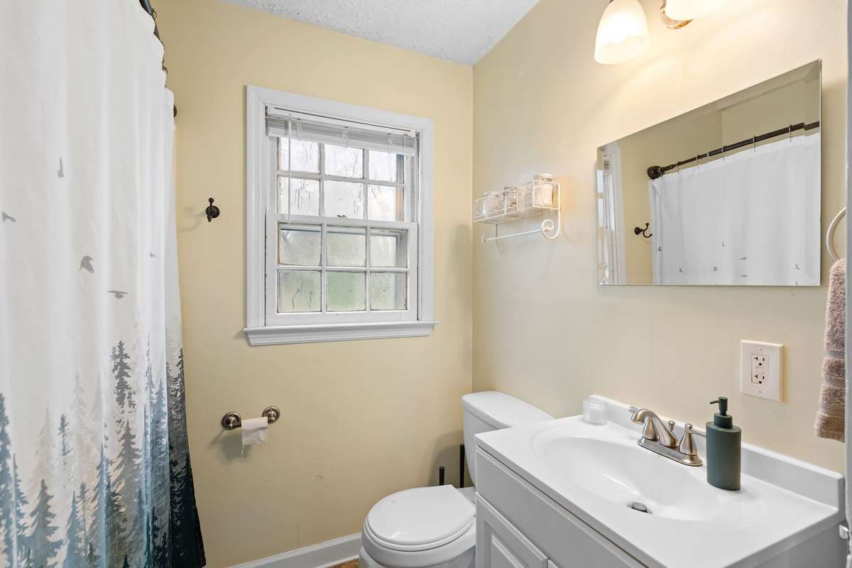 Full bathroom with single-sink vanity!