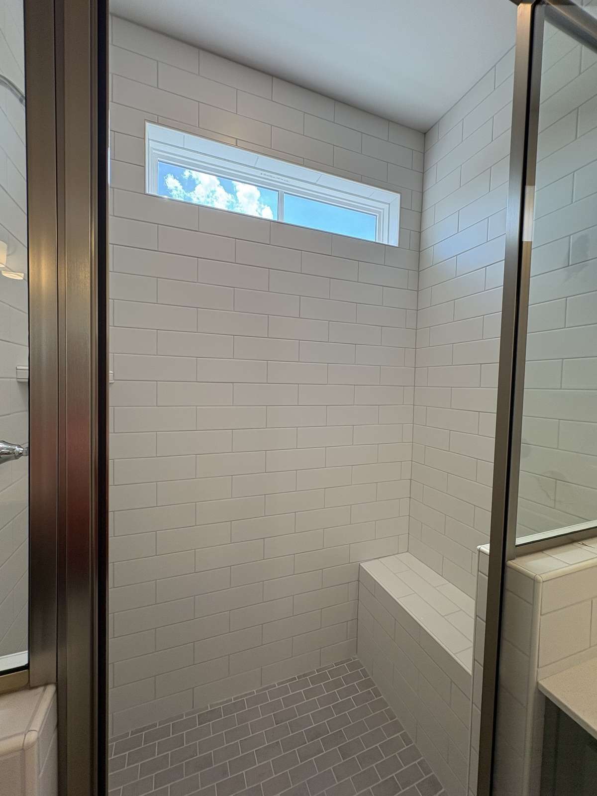 Master tile shower with bench