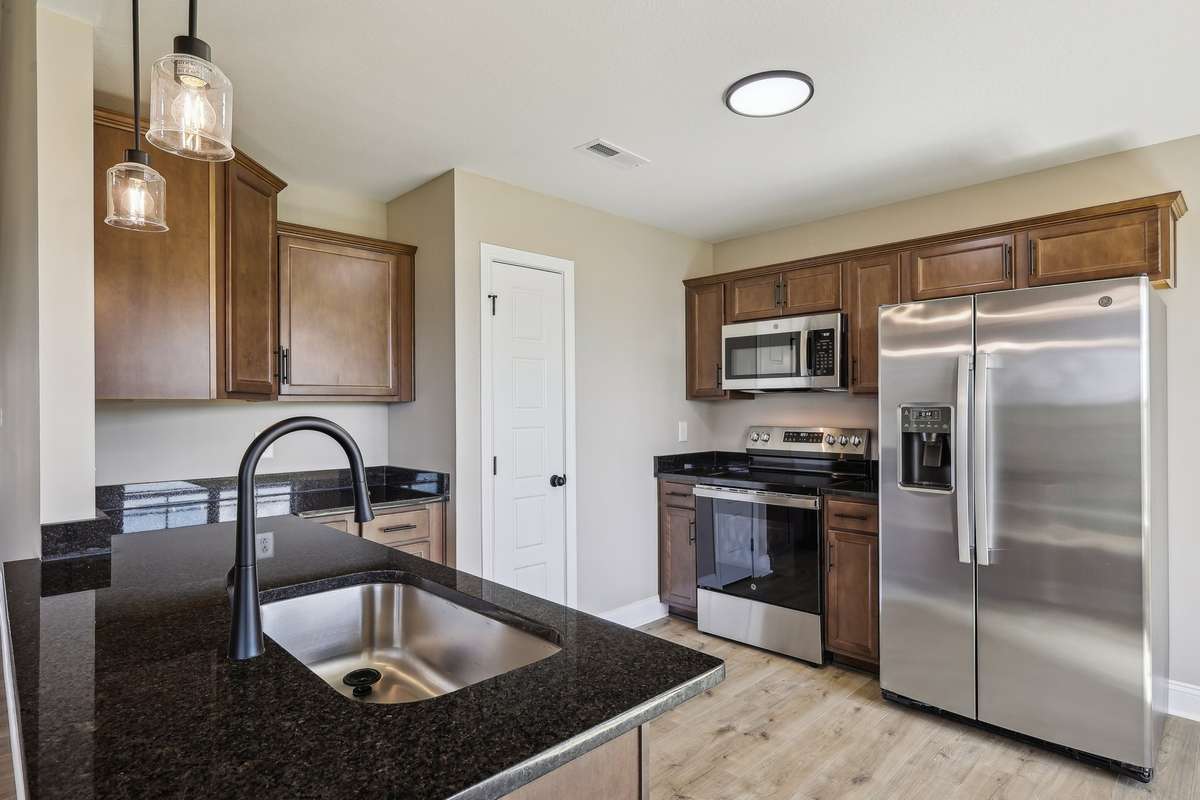 Sample pictures from a previous build showing the Bailey Floor Plan. Materials and colors are subject to change without notice.