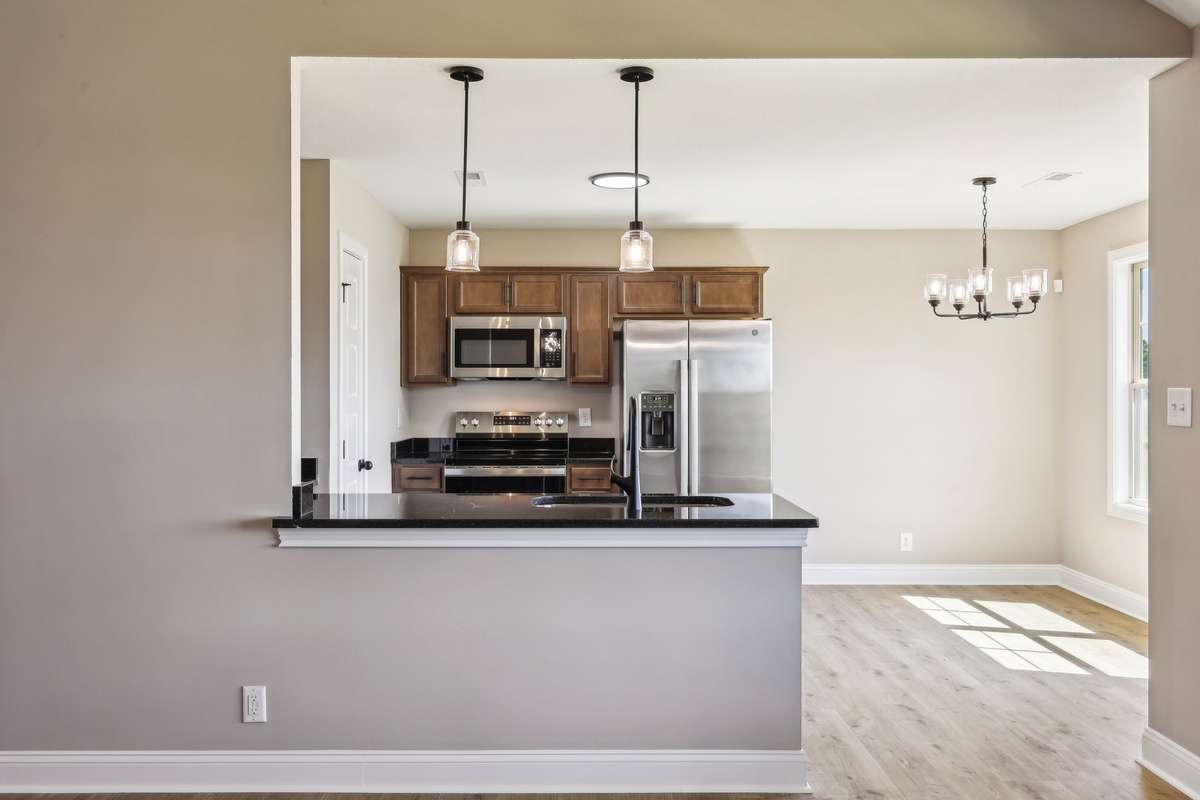 Sample pictures from a previous build showing the Bailey Floor Plan. Materials and colors are subject to change without notice.
