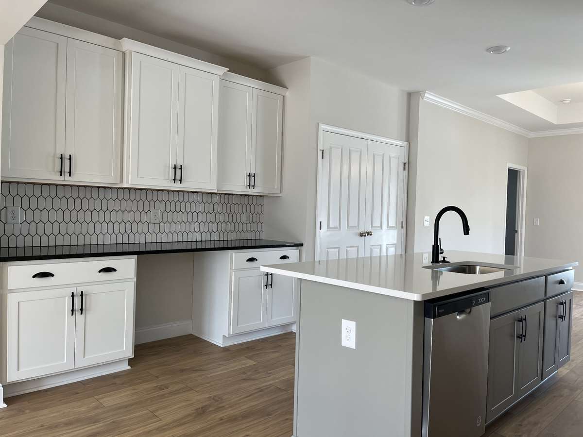 Kitchen with work station.  NOT ACTUAL HOME