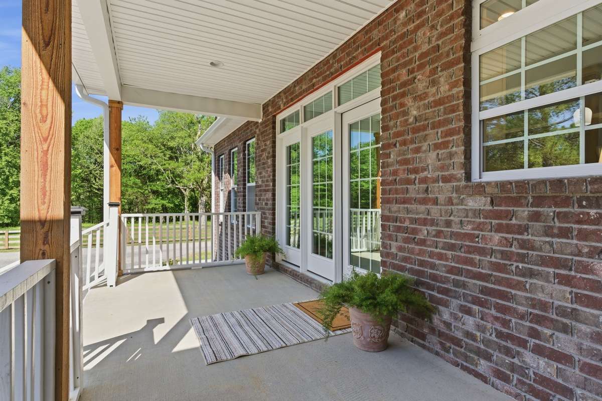 Watch the kids play from your Covered Back Patio