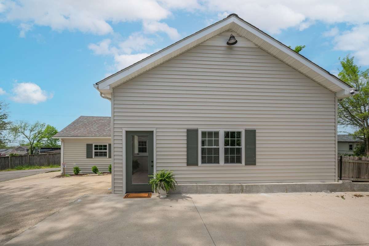 Trendy Guest Cottage with All NEW Fully Equipped Kitchen : 2 Beds, 1 Full Bathroom , Dining/ Living Kitchen Combo *Excellent Climate Controlled Storage Above. One Garage Up-Sized Garage. 760 Sq Ft Approx of Living Space all on One Level  All NEW HVAC