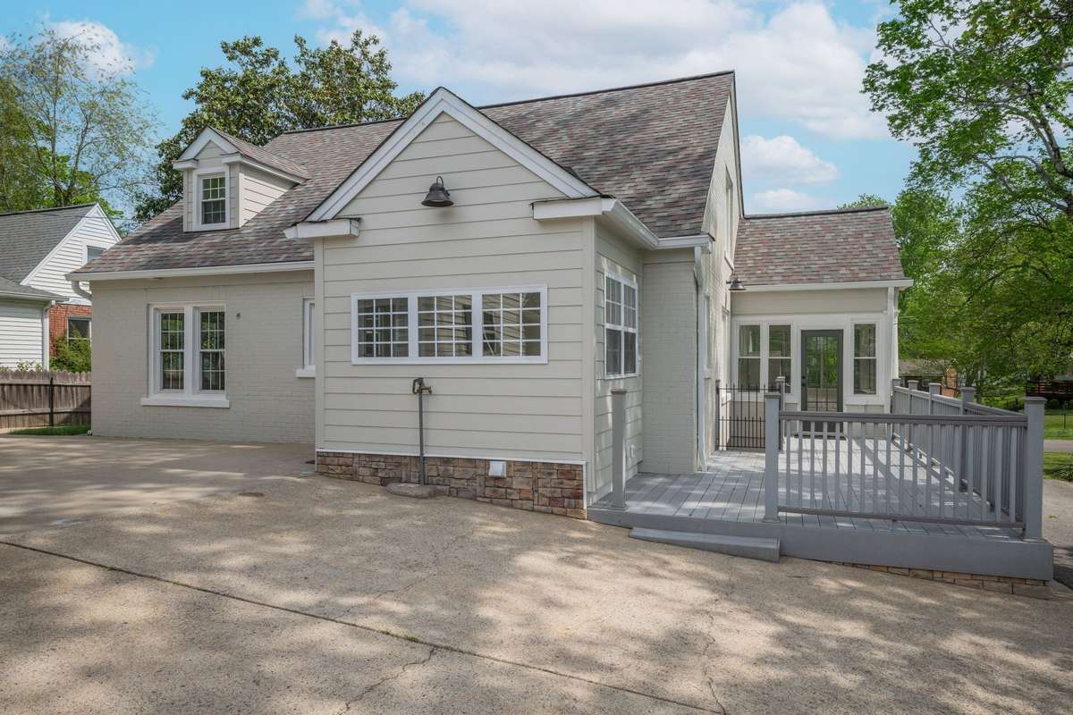 Brick and Hardi Exterior with Stone Accents *Trex Deck Area