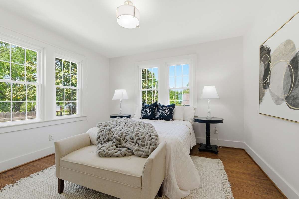 Primary Suite is located on the Main Level with Sand/Finished Hardwood Floors and Adjoining Full Bath & Huge Walk In Closet