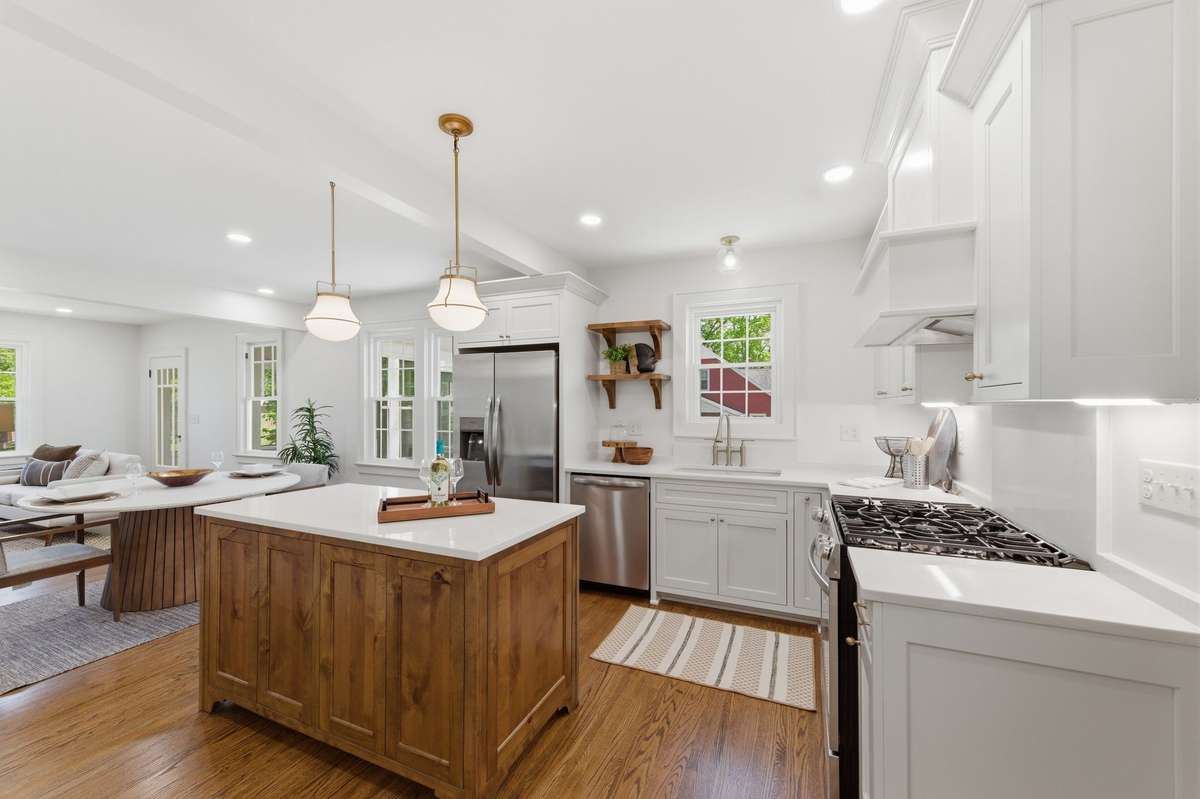 Gorgeous Island Offers wonderful work space in this well equipped kitchen - Stainless Appliance Package Includes: Gas Stove, Dishwasher, Refrigerator, Microwave