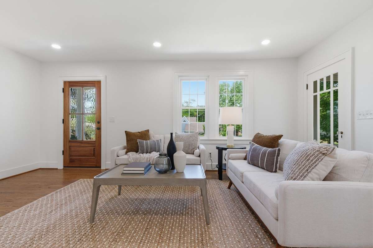 Living Room with Hardwood Floors *Door Leads out to Sunroom