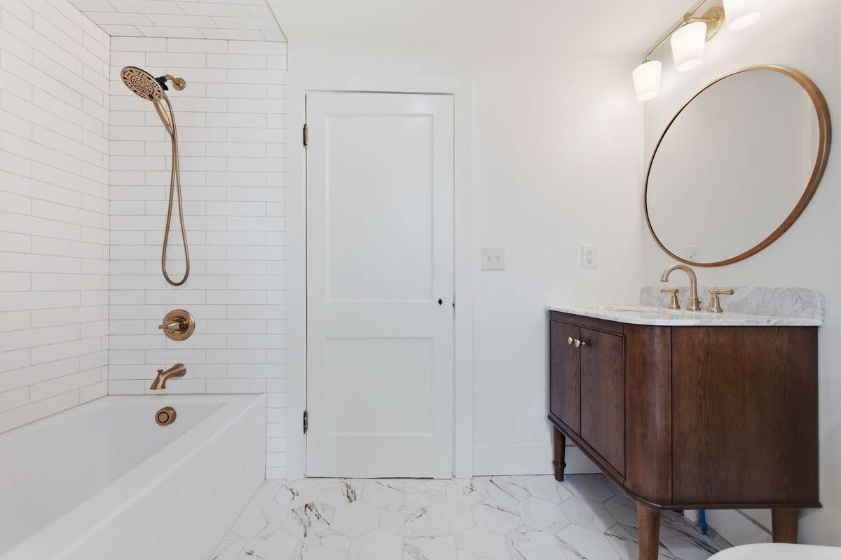 Upper Level Full Bath- Subway Tile Surround Tub/Shower * The Perfect Lighting, Mirror and Fixtures have been selected