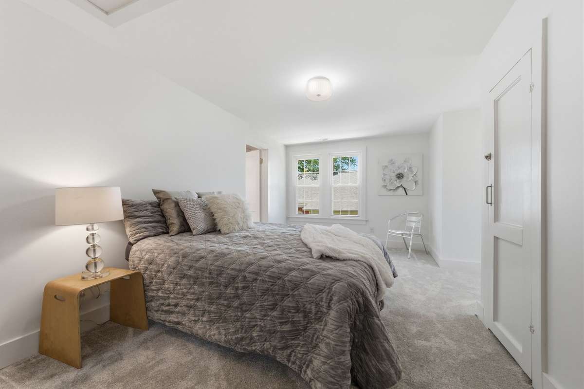 Upper Level Offers a 2nd Suite with Lots of Closet Space & Adjoining Full Bath