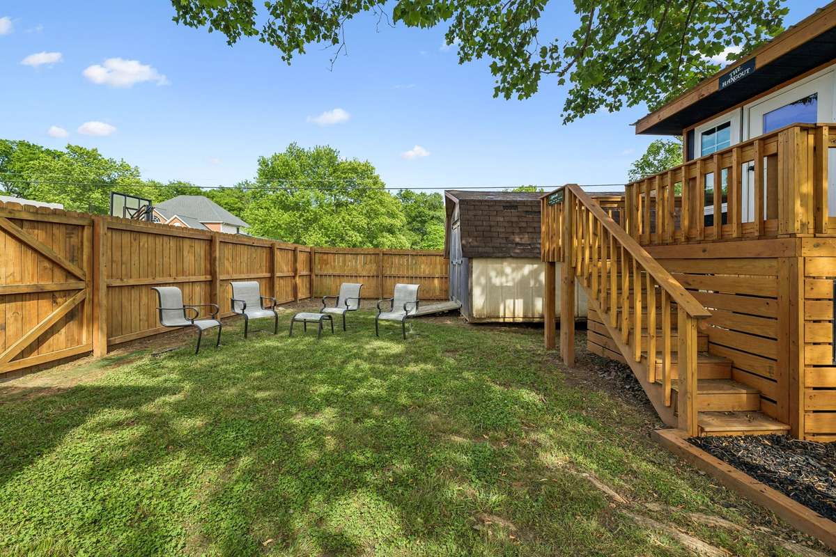 Playset and storage building add function and fun to the backyard.