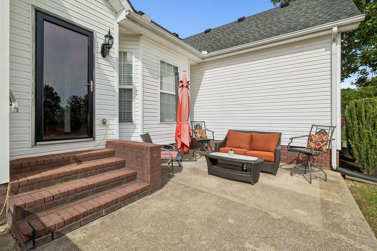 Back patio area perfect for relaxing or grilling.