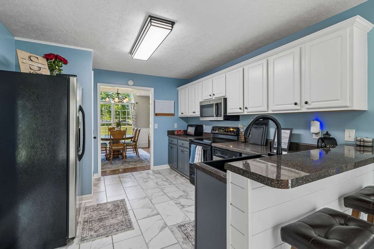 Kitchen view toward the formal dining room.