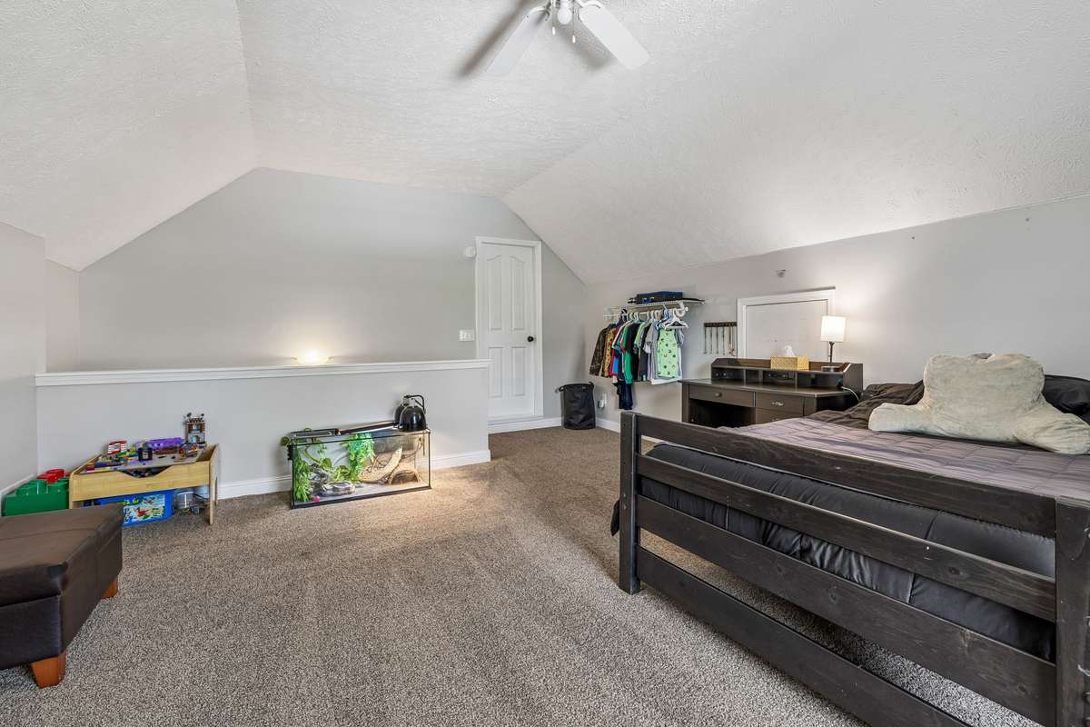 Large upstairs room with room for bedroom, playroom, or office use.