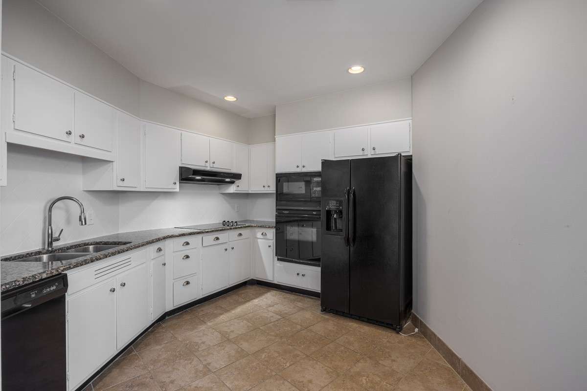 Built in microwave and oven, cooktop, refrigerator and dishwasher, all stay