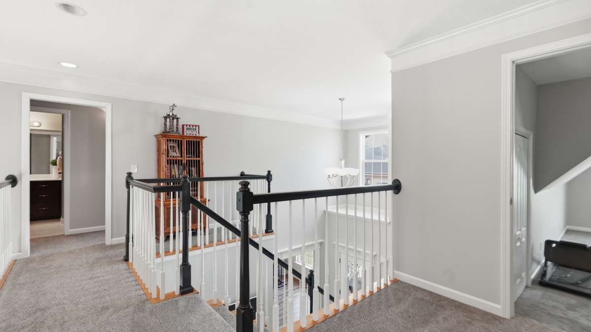 Open balcony overlooking living room
