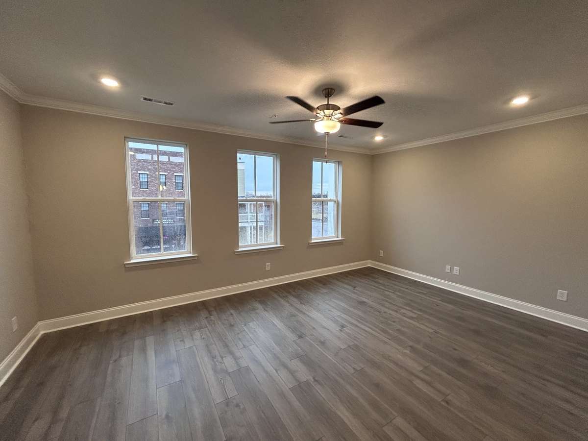 Great Room THIS PHOTO IS OF A PREVIOUSLY BUILT SIMILAR PROPERTY. THE FINISHES IN THIS UNIT MAY DIFFER.