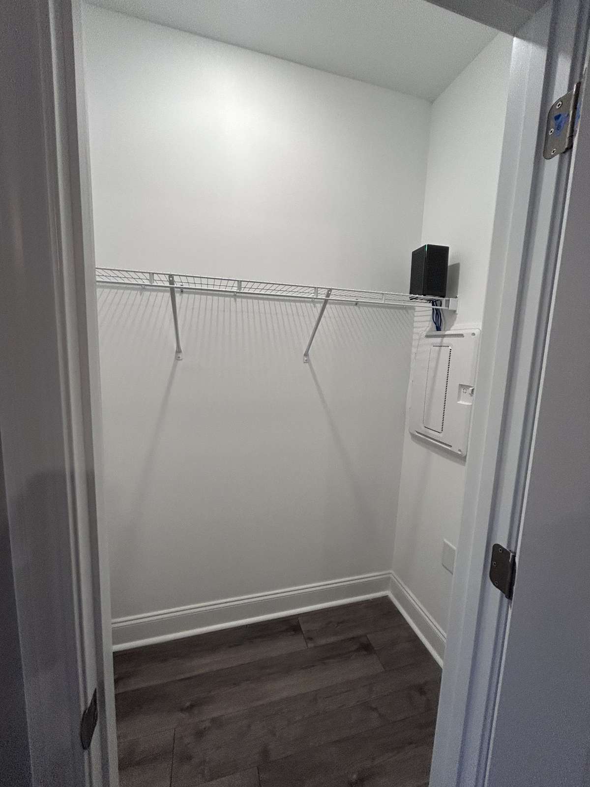 Coat closet  THIS PHOTO IS OF A PREVIOUSLY BUILT SIMILAR PROPERTY. THE FINISHES IN THIS UNIT MAY DIFFER.