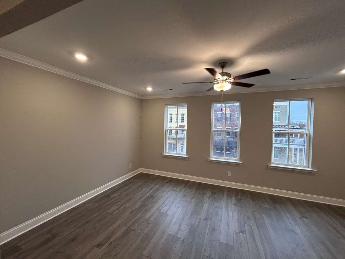 Great Room  THIS PHOTO IS OF A PREVIOUSLY BUILT SIMILAR PROPERTY. THE FINISHES IN THIS UNIT MAY DIFFER.