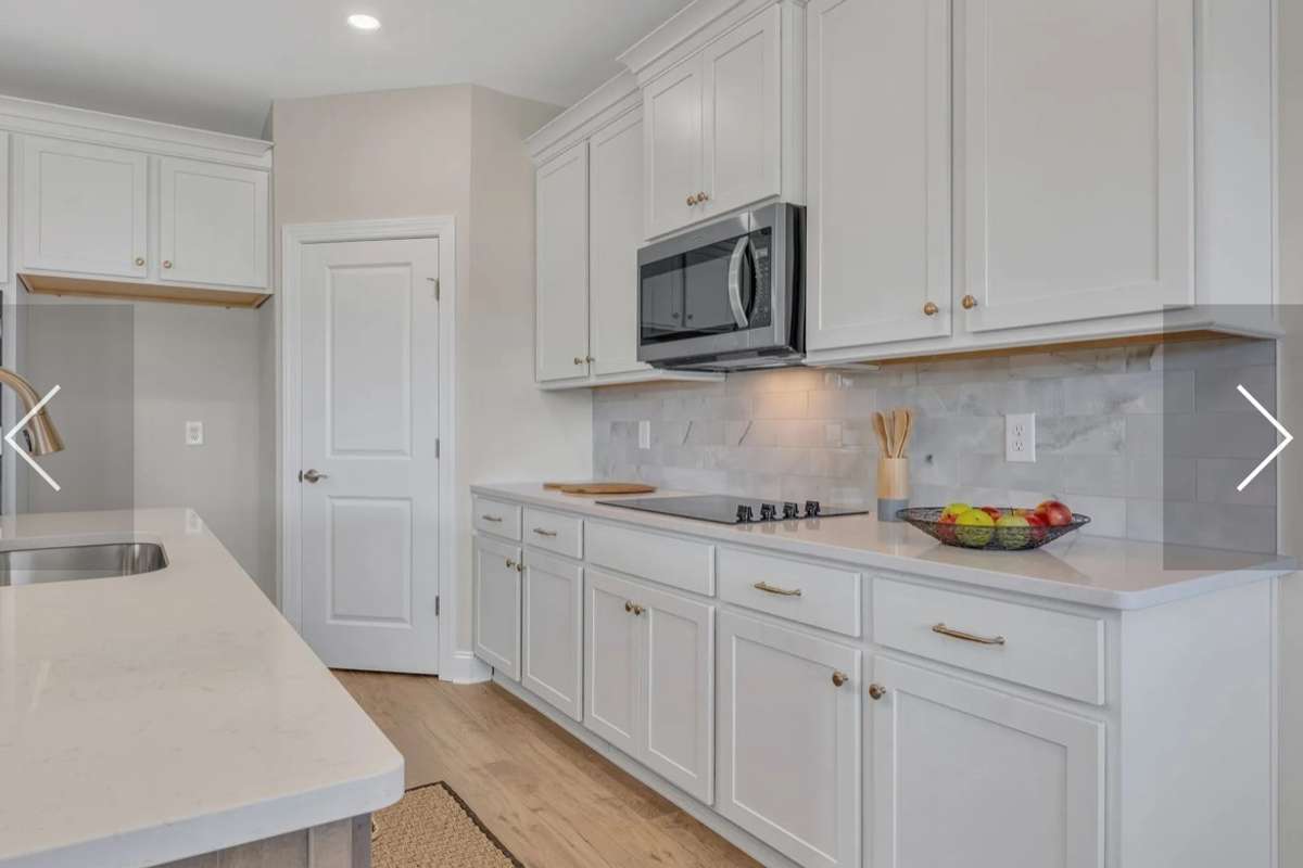 This photo is of a previously built RIDGELAND II  Home and is a good representaion of the home being built in Rutherford of Columbia on lot 39. Finishes and colors may vari on the actual home in Rutherford lot 39