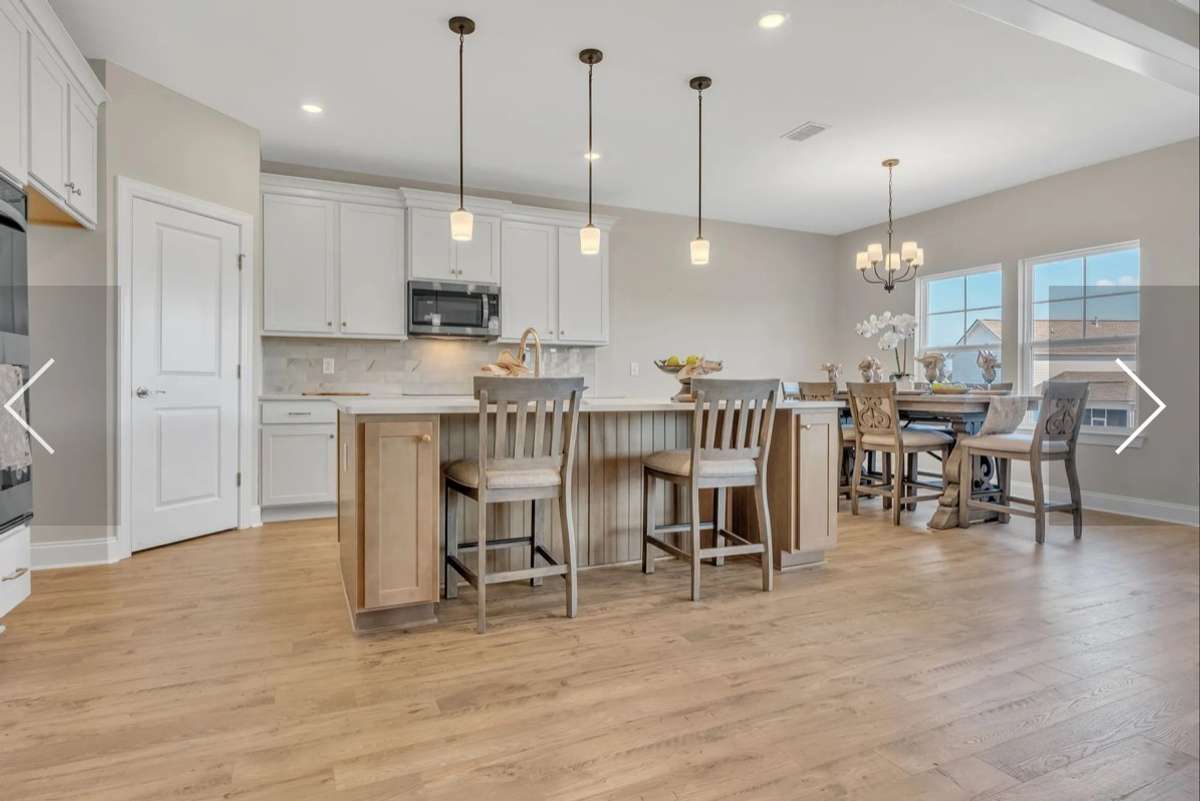 This photo is of a previously built RIDGELAND II  Home and is a good representaion of the home being built in Rutherford of Columbia on lot 39. Finishes and colors may vari on the actual home in Rutherford lot 39