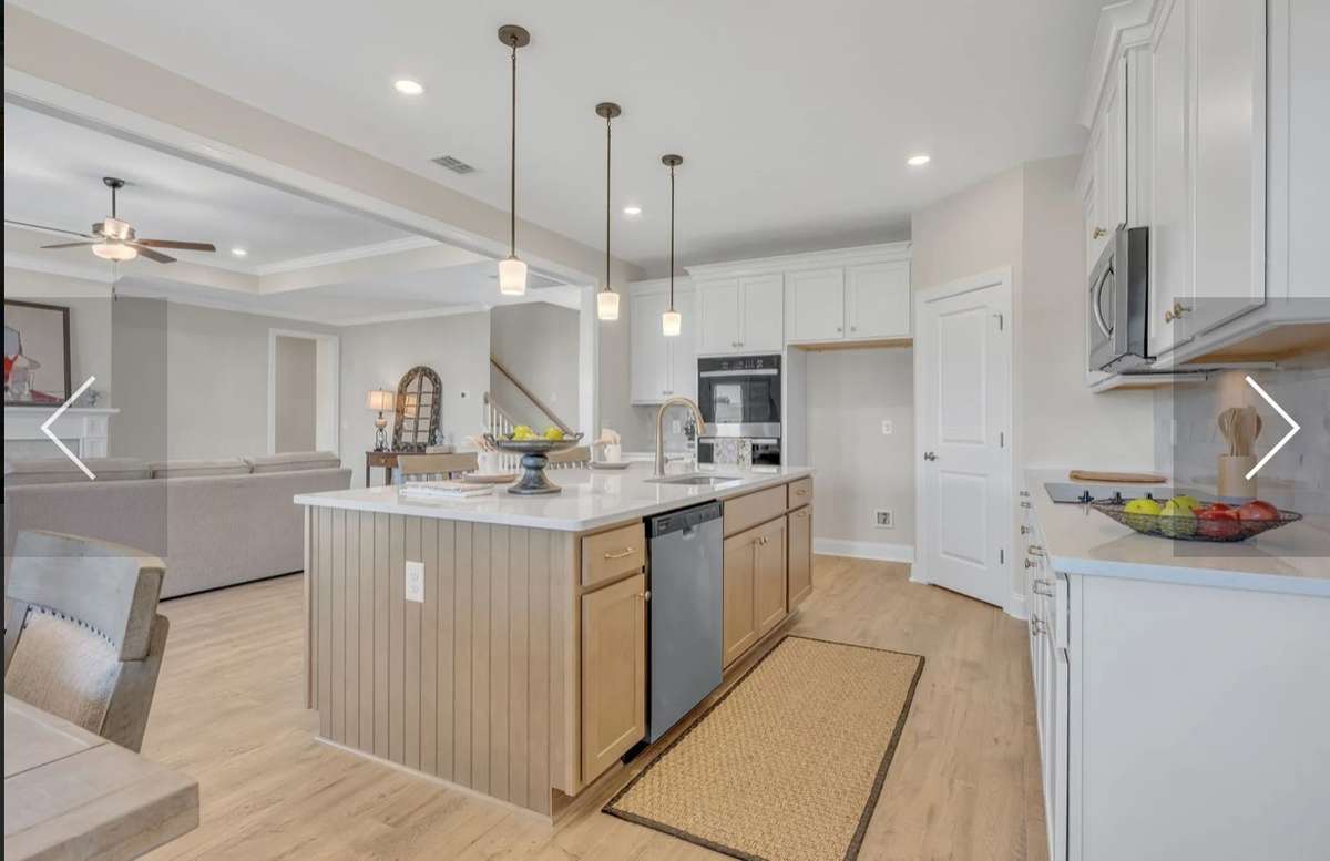 This photo is of a previously built RIDGELAND II  Home and is a good representaion of the home being built in Rutherford of Columbia on lot 39. Finishes and colors may vari on the actual home in Rutherford lot 39