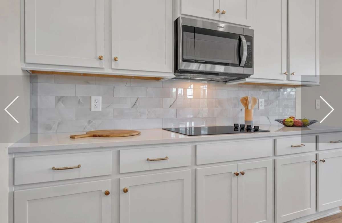 This photo is of a previously built RIDGELAND II  Home and is a good representaion of the home being built in Rutherford of Columbia on lot 39. Finishes and colors may vari on the actual home in Rutherford lot 39