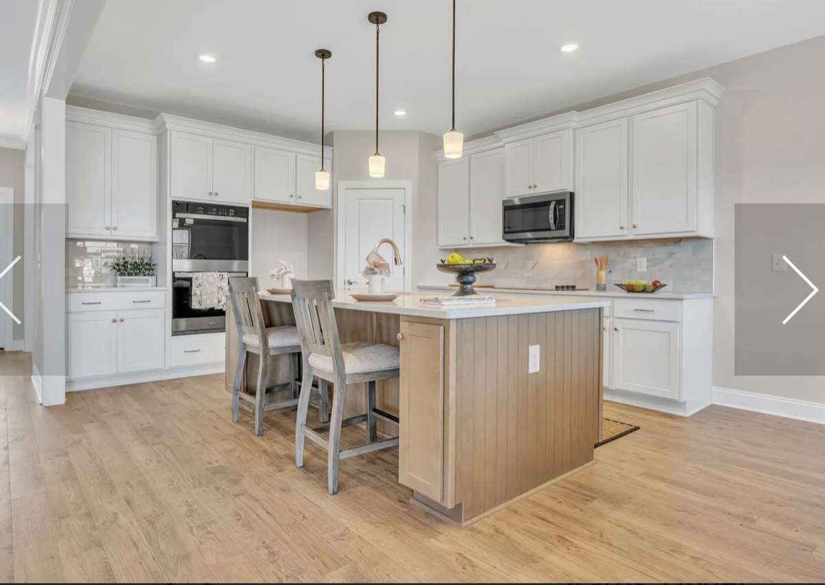 This photo is of a previously built RIDGELAND II  Home and is a good representaion of the home being built in Rutherford of Columbia on lot 39. Finishes and colors may vari on the actual home in Rutherford lot 39