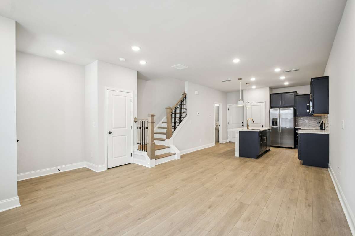 ***Photo taken from a previously built Esplanade townhouse. Professional photos coming soon for this property.***

Open-Concept 1st Floor