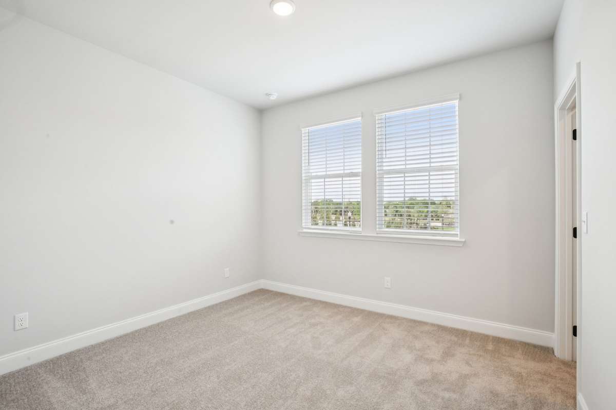 ***Photo taken from a previously built Esplanade townhouse. Professional photos coming soon for this property.***

Bedroom #2