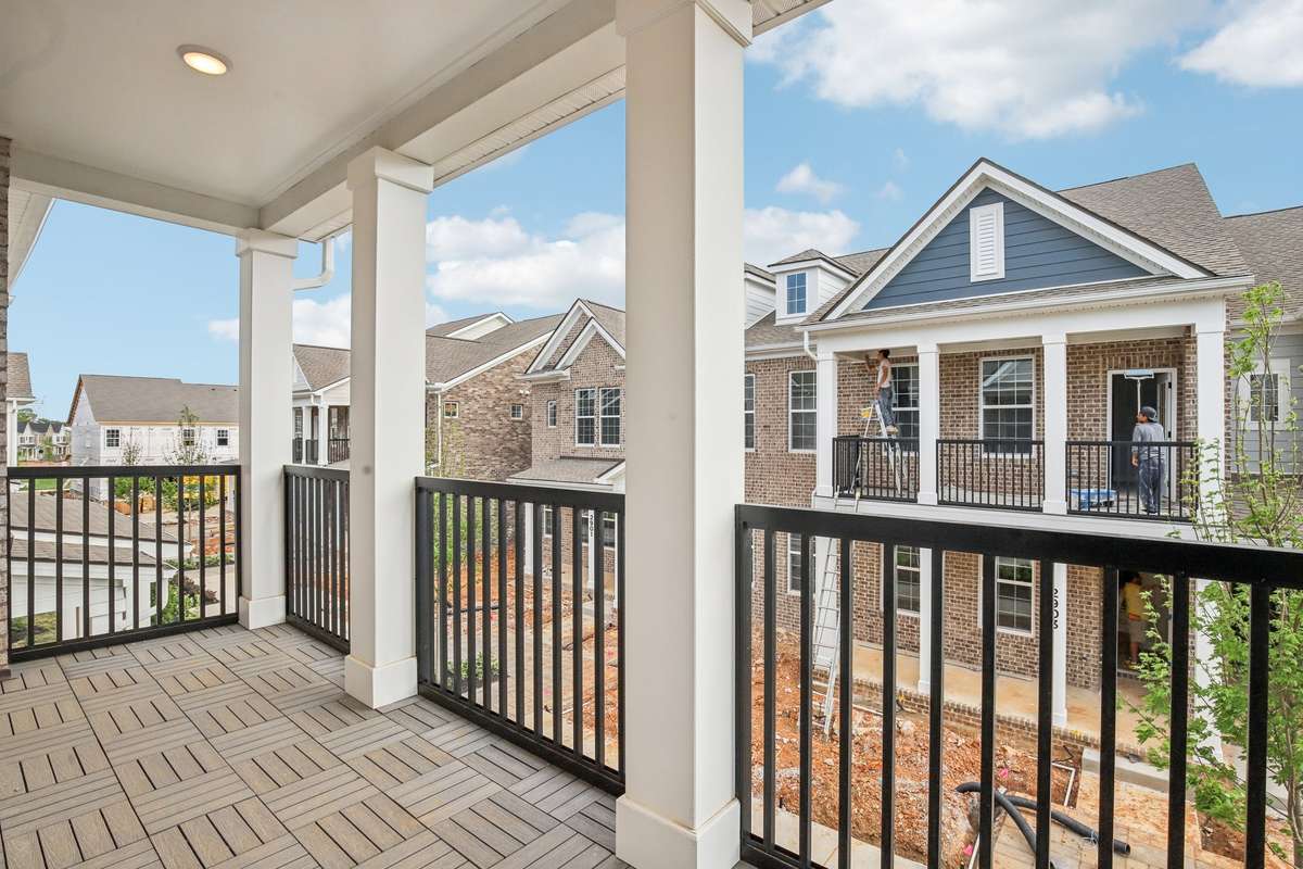 ***Photo taken from a previously built Esplanade townhouse. Professional photos coming soon for this property.***

Balcony Off Primary Bedroom