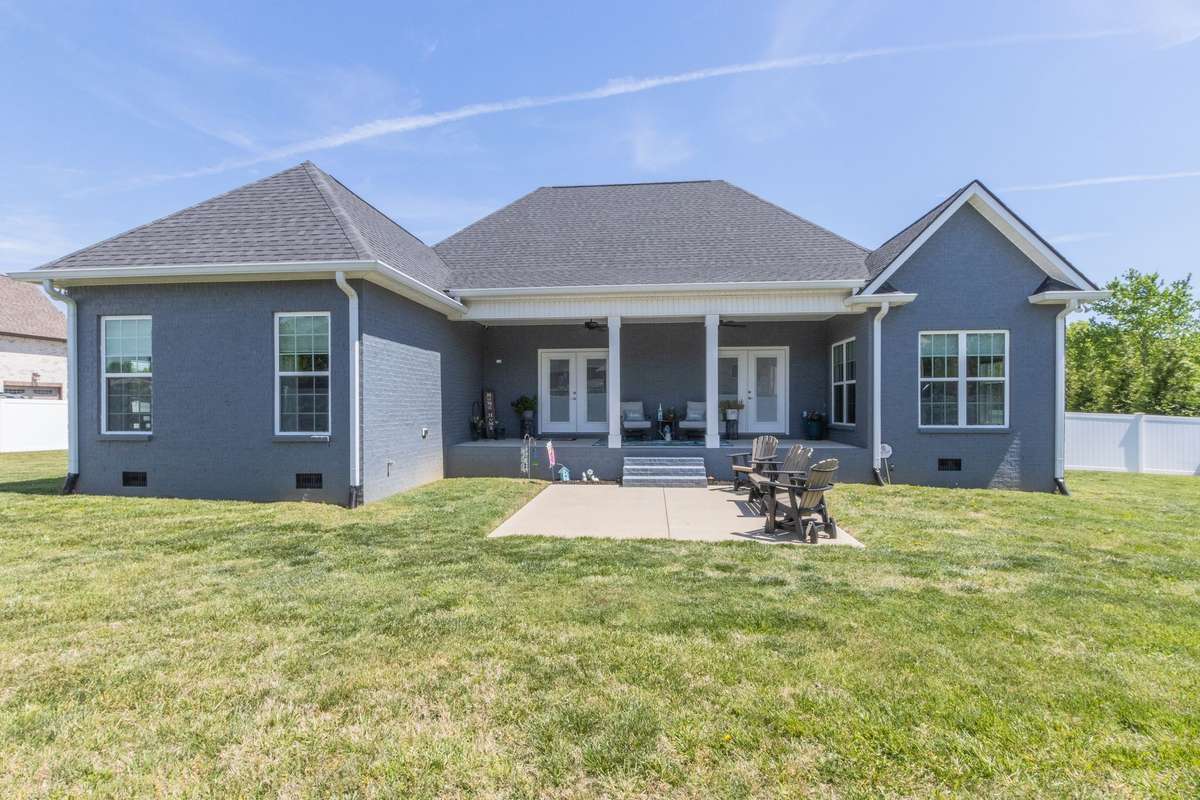 Check out that yard space with additional concrete patio