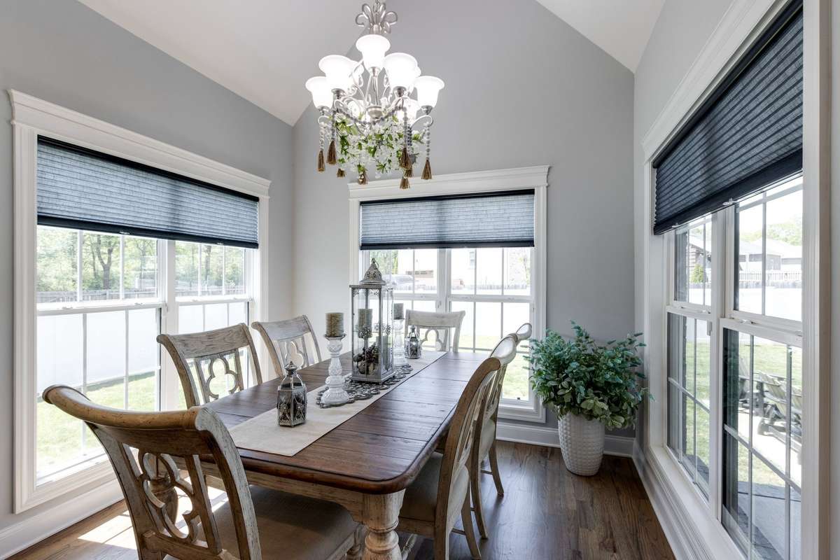 Dinning room off the Kitchen for all your gathering needs.  Check out all those windows!!  This house has so much natural light!