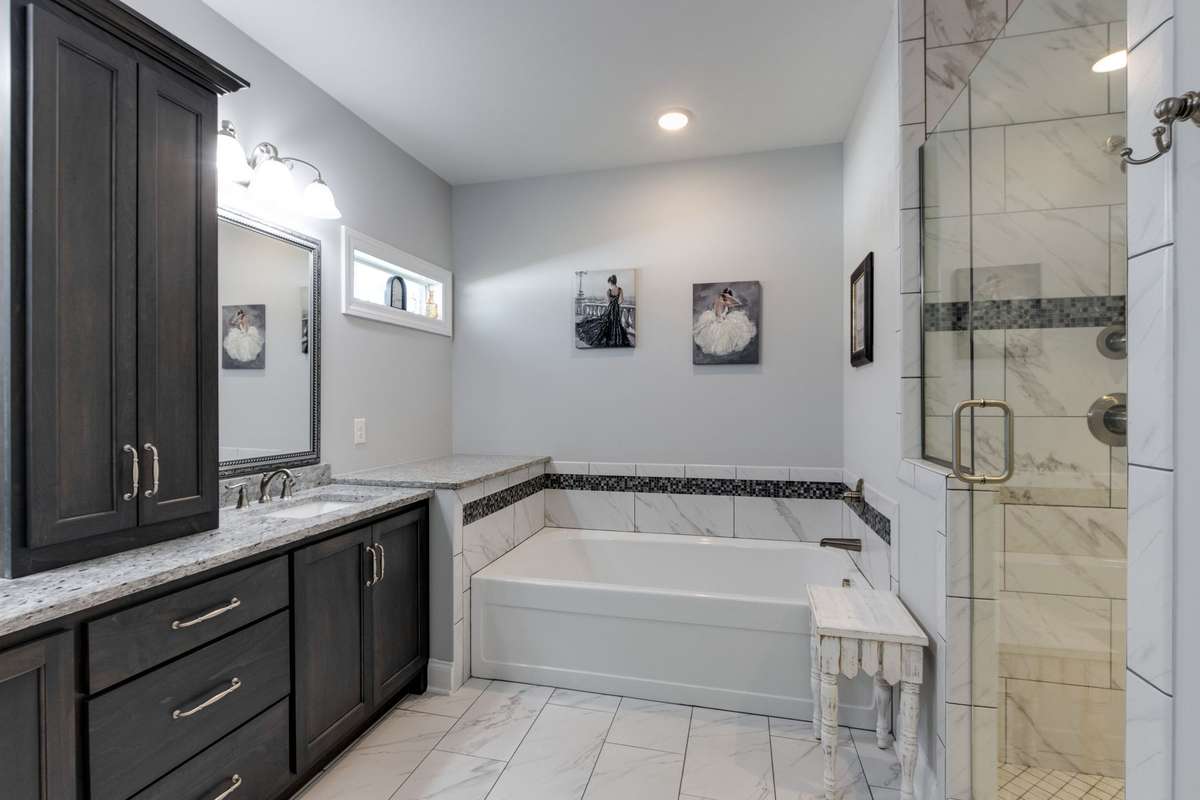 Stunning primary bathroom with nice soaking tub and walk in shower!