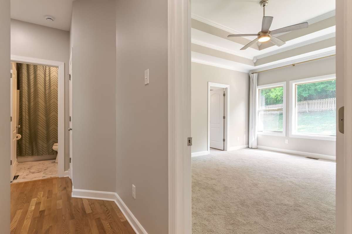 Hallway off living area - primary to right
