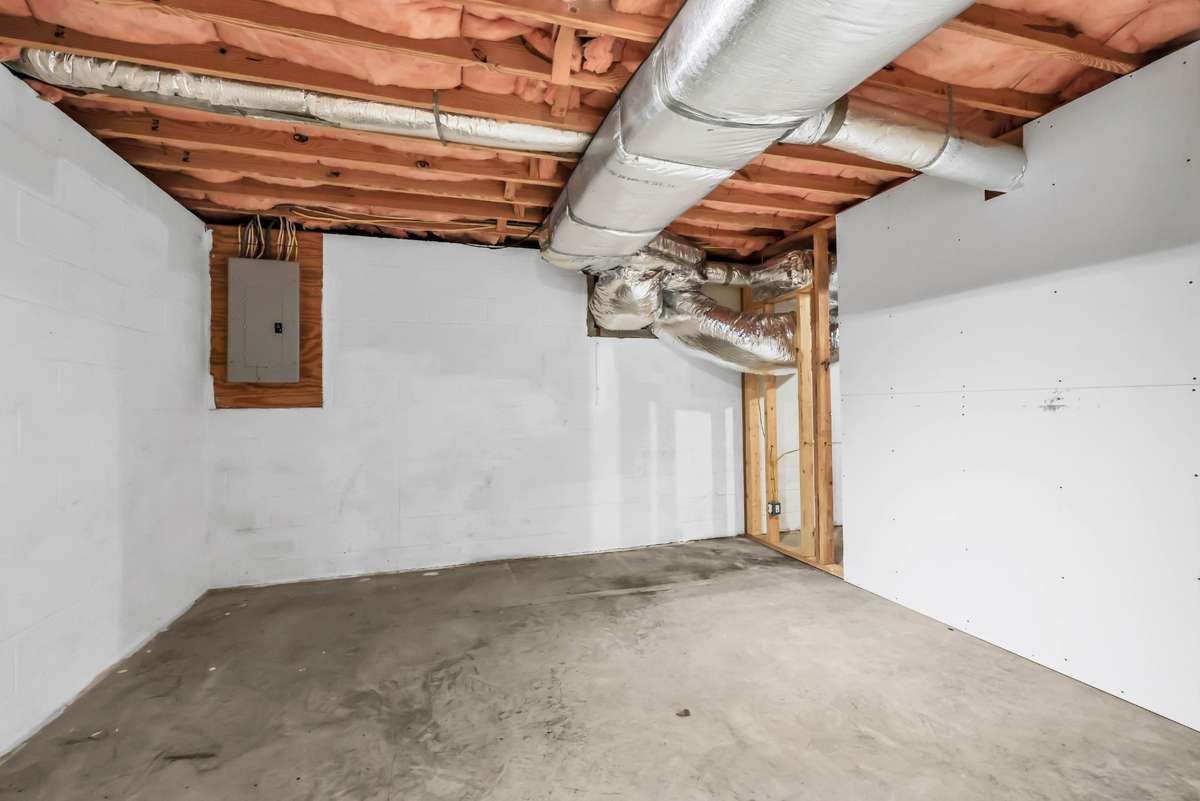 One Partially finished room area in basement (extra drywall on site to complete)