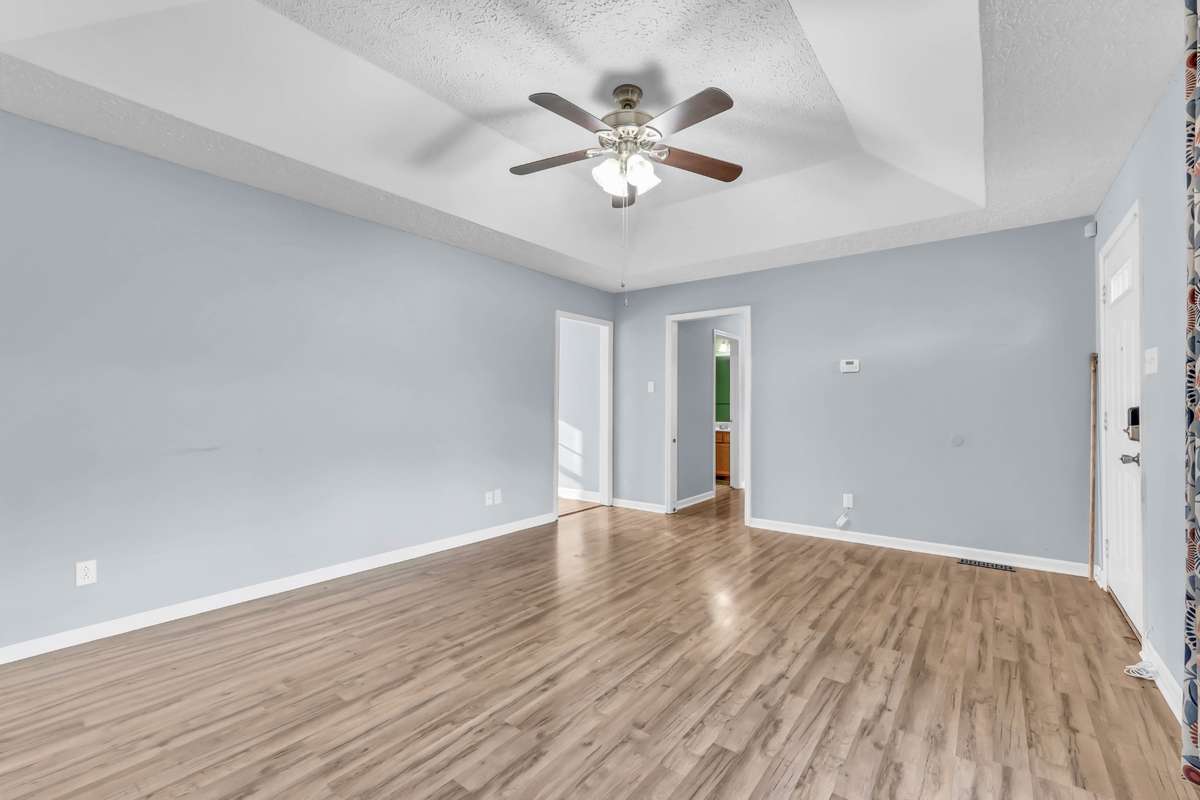 Second view of Great room leading to kitchen & hallway