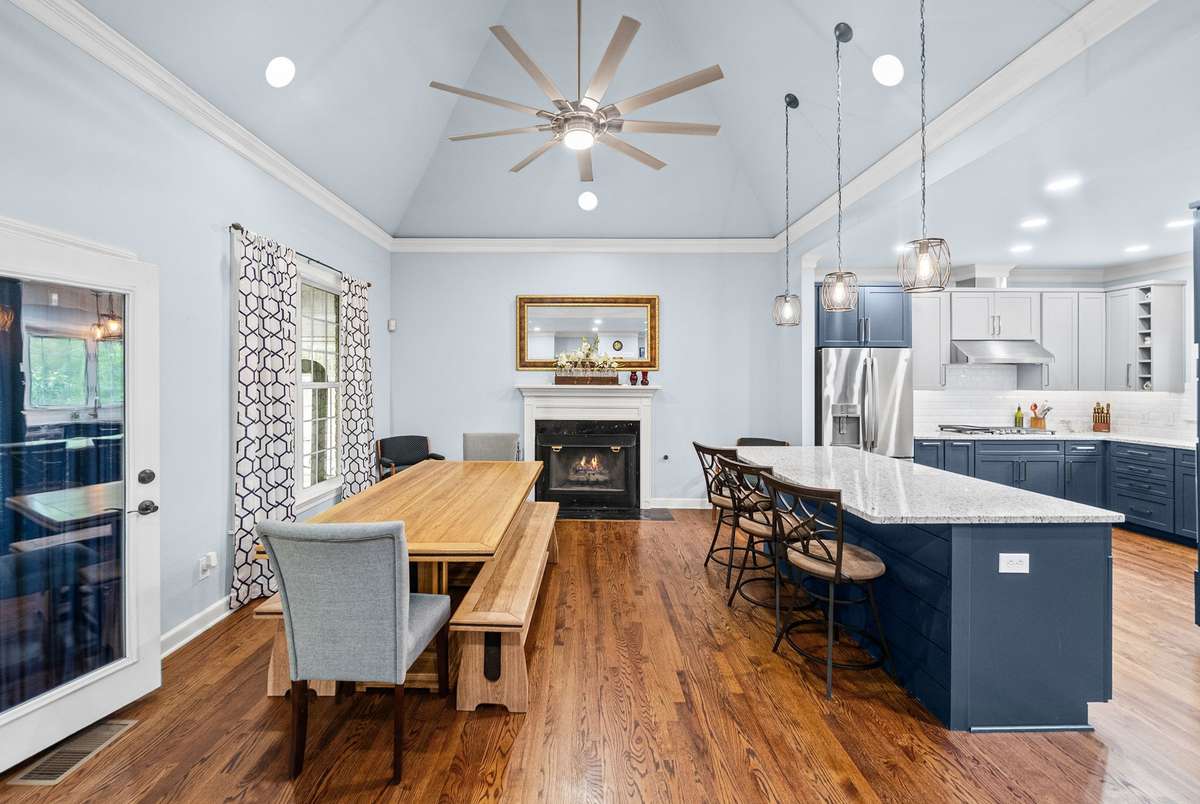 Wonderful area for entertaining with kitchen island and large dining area with fireplace