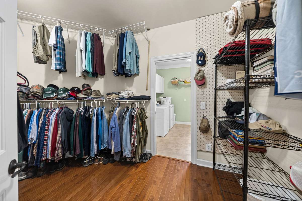 Massive walk in closet walks into laundry room