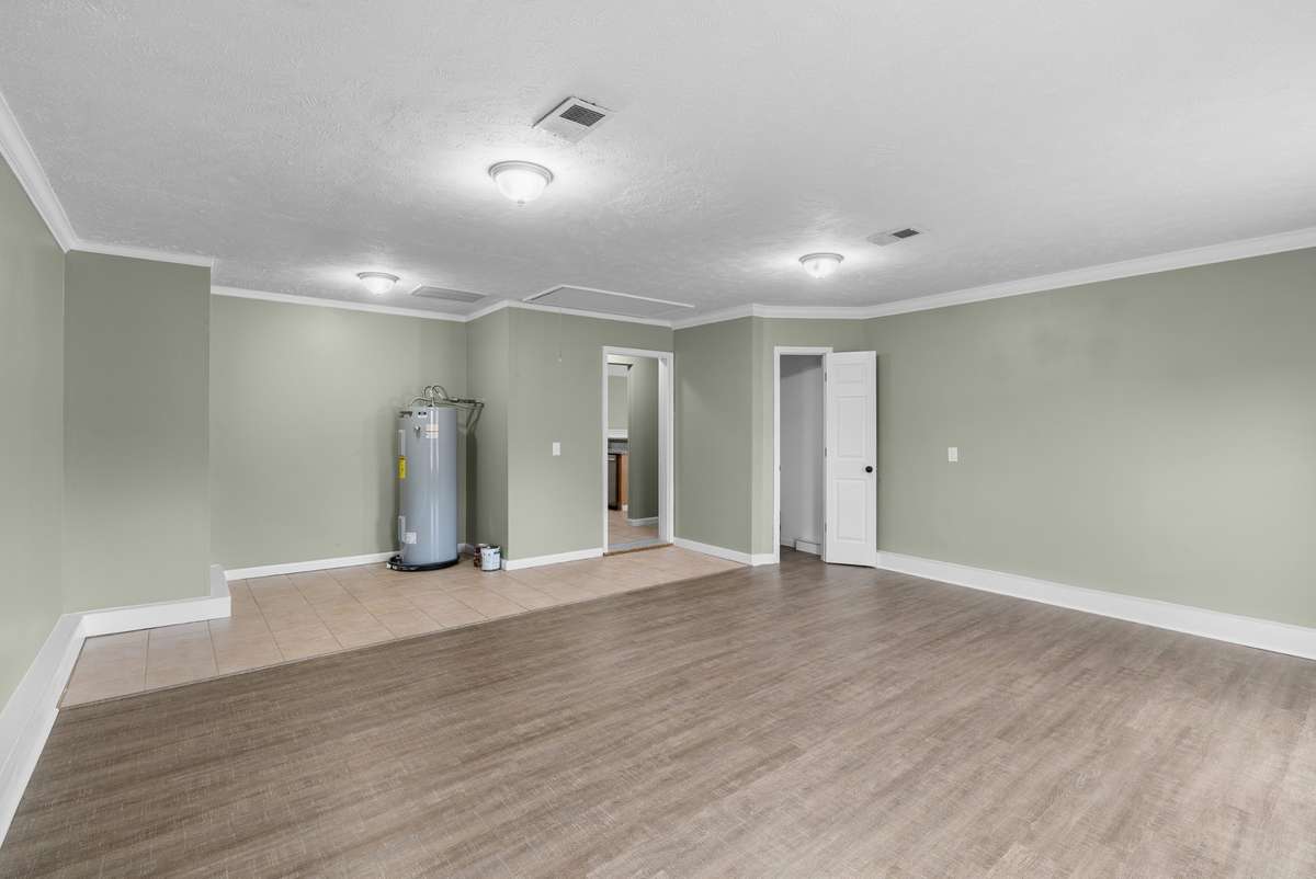 This flexible room is perfect for a media space, playroom, or creative studio.