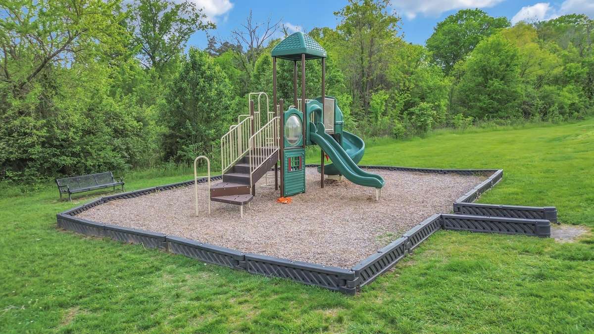 The Tot Lot playground is located near the coffee shop, sourdough bakery and pilates studio.