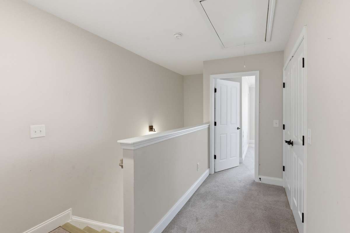 Upstairs - 2 ensuite bedrooms each with their own full bath, laundry and attic storage.