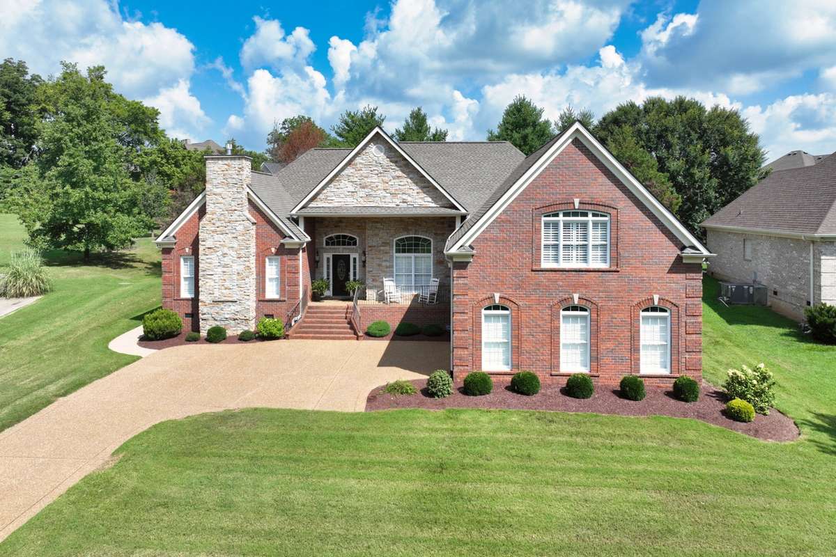 All Brick Exterior & Timeless Stone Accents, Custom Plantation Shutters throughout entire Home.