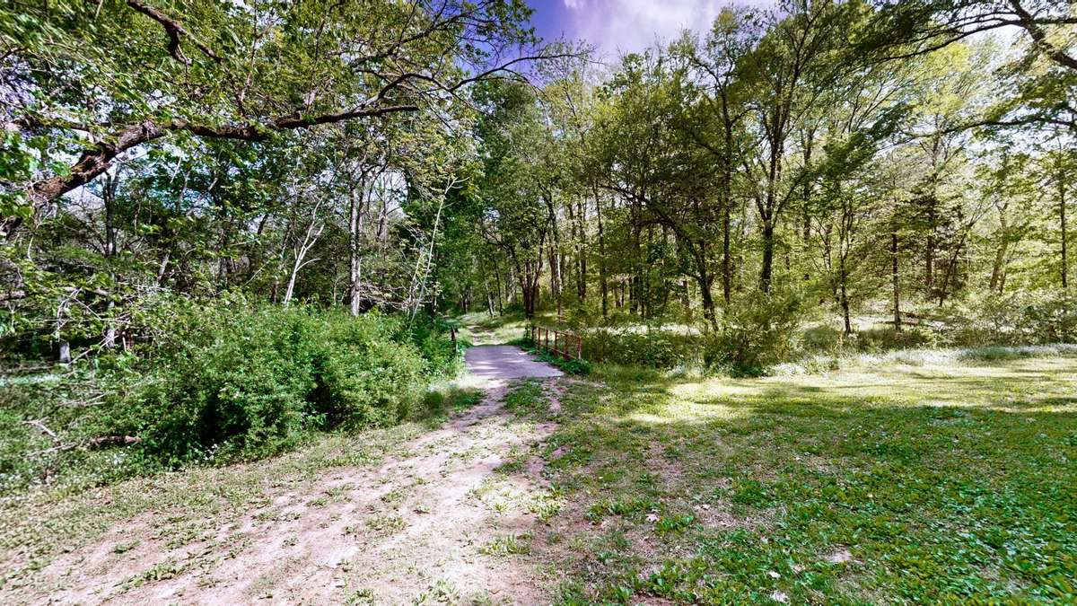 Bridge Access to Back Acreage with Established Trails